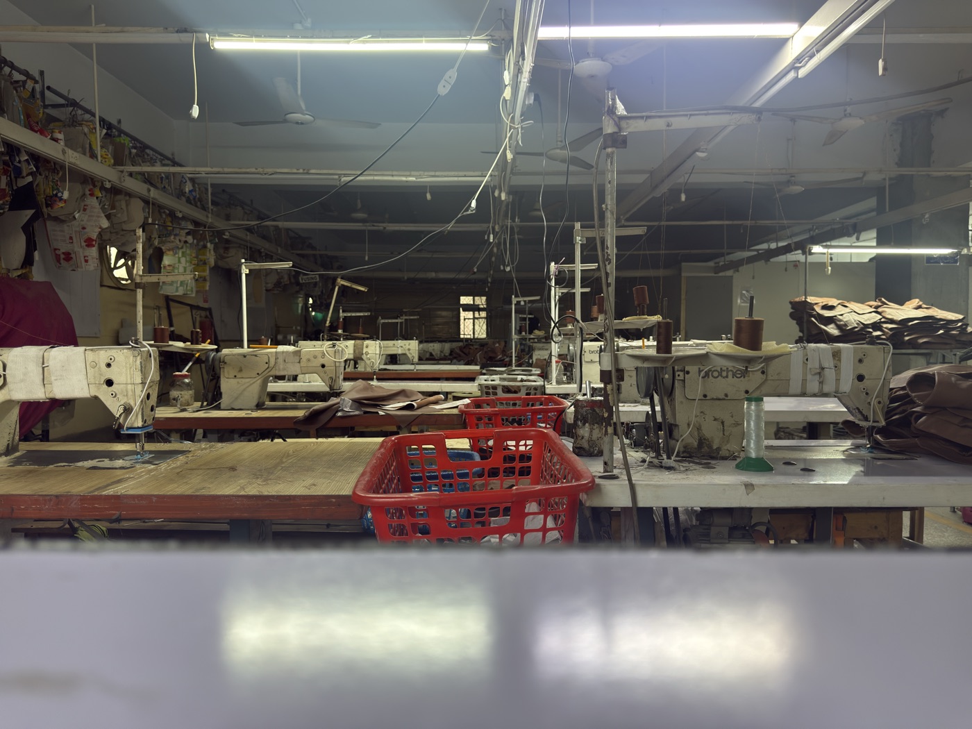 Industrial Brother sewing machines on the stitching floor at Mac Leather factory