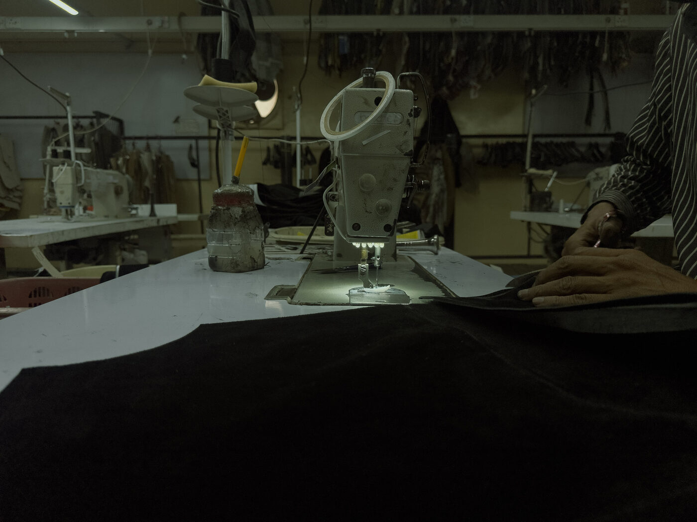 A leather jacket panel being stitched on an industrial machine at Mac Leather’s factory in Karachi, Pakistan